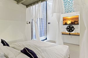 studio room with a small mezzanine