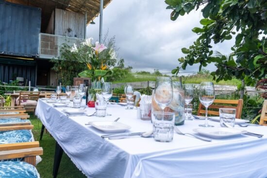 Beautiful table set up for dinner on the outdoor deck.